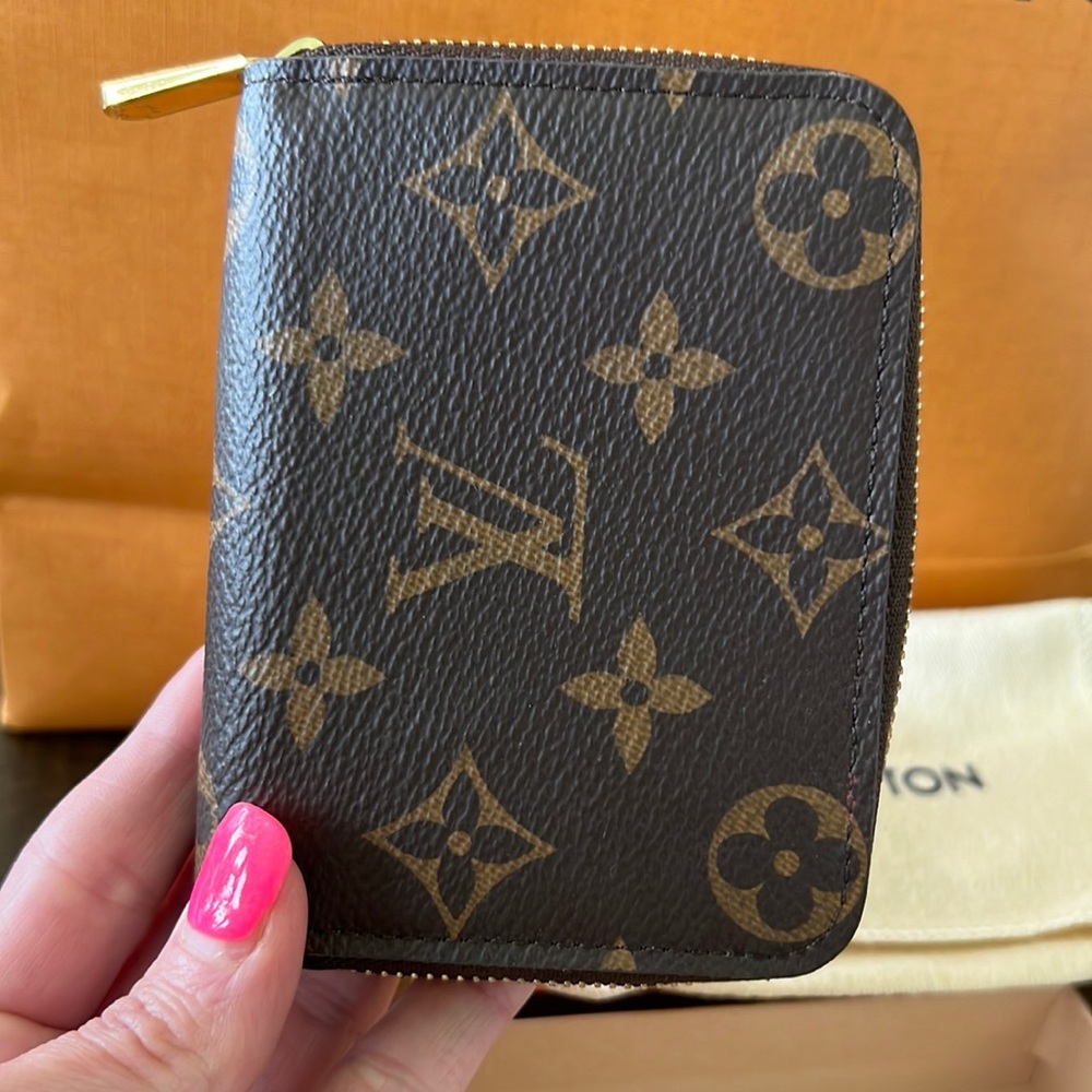 Monogram is a zippy coin purse